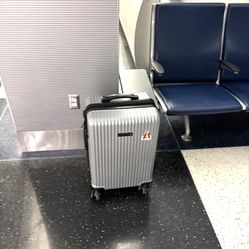 Gray Suitcase (hardcover)