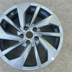 2016 Nissan Rogue wheel 18x7 dark gray