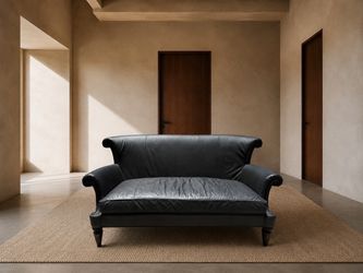 Black Leather Sculptural Sofa – 78”