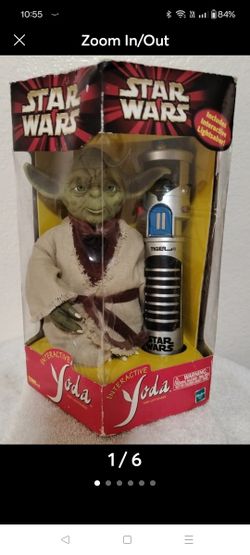 Vintage Star wars interactive Yoda with lightsaber