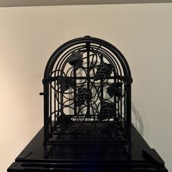 Black Wine Rack, holds 9 bottles Of Wine. Open Door With Latch.