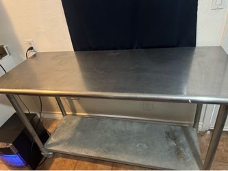 Stainless steel table with wheels