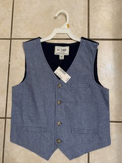 Chaleco nuevo talla 7/8 en 9 dls