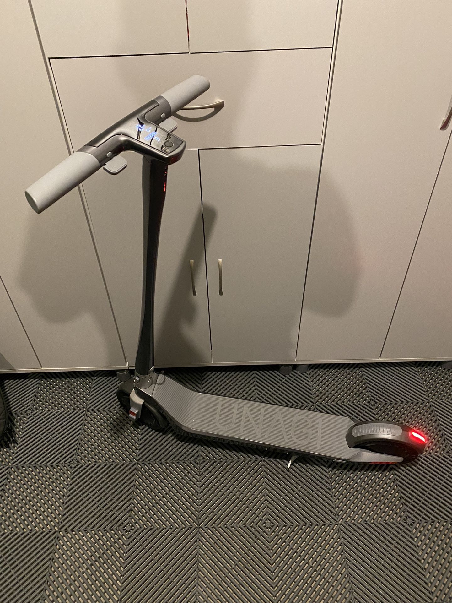 New / Excellent Condition UNAGI Scooter With Travel Bag And Lock!!!!