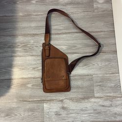 Brown leather crossbody bag with adjustable strap