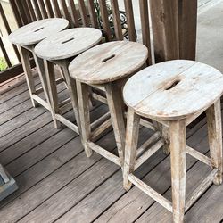 5 rustic wooden stools