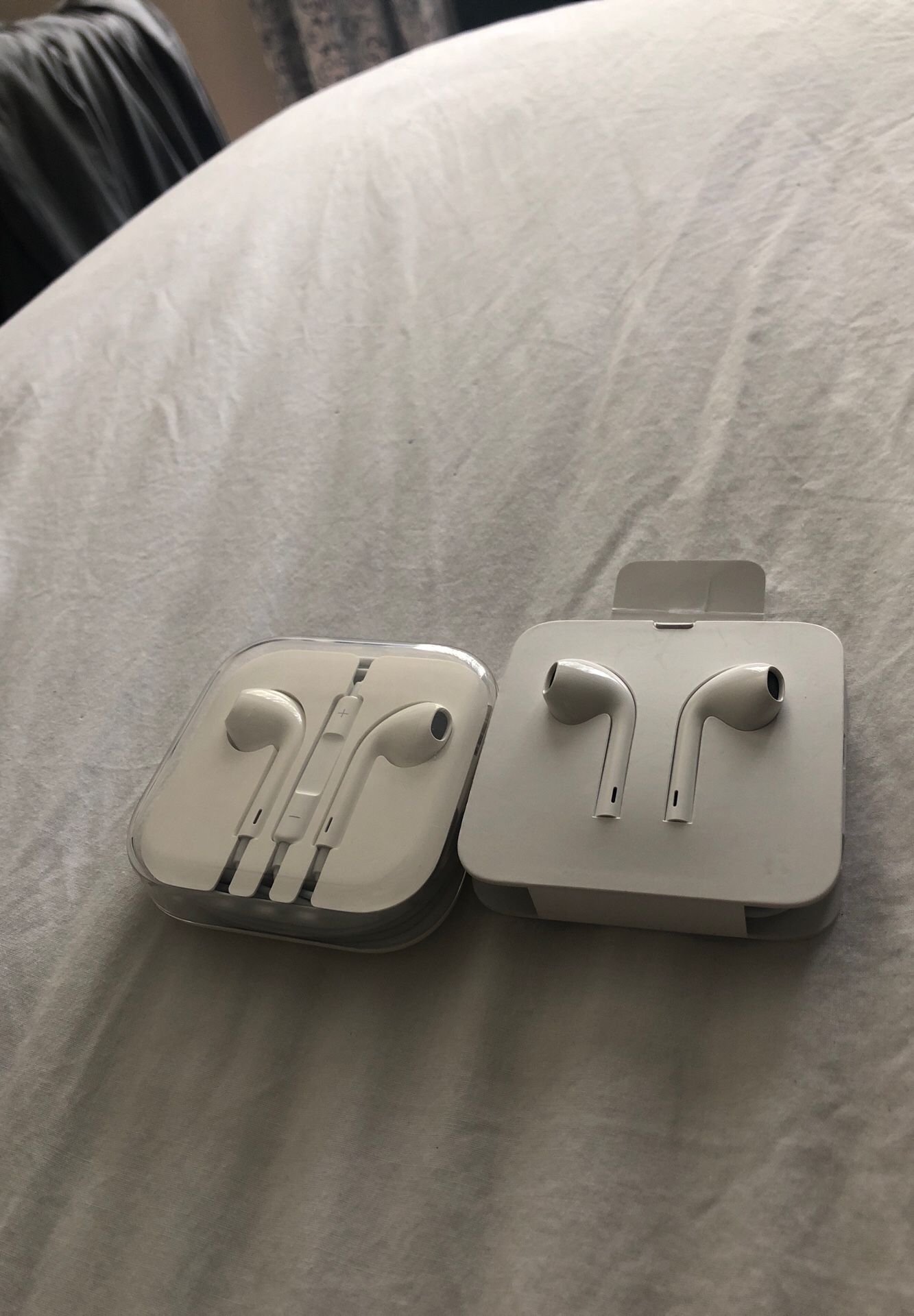 BRAND NEW Apple headphones!! Not wireless. One in box and one without but both NEVER USED.