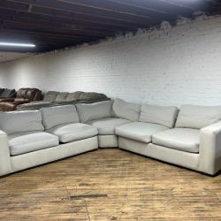 Delivery available light gray L sectional couch