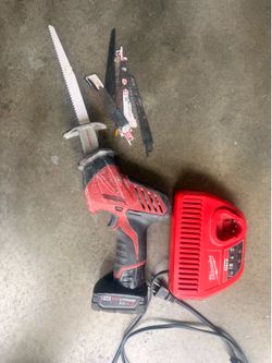 Milwaukee hacksaw & charger