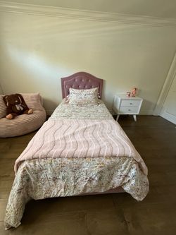 Twin bed, vanity and night stand