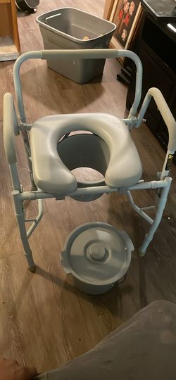 Drive Medical Steel Drop Arm Bedside Commode with Padded Seat and Arms
