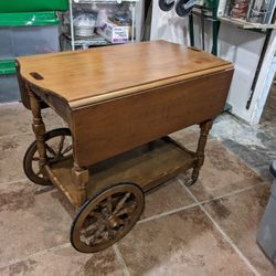 Antique Rolling Table. Solid wood. 34W x 20D x 28H