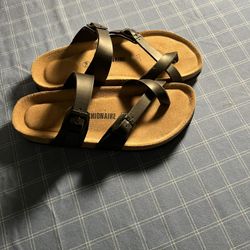 Comfortable Cushionaire Sandals with adjustable straps.