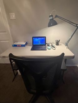 Only desk, chair and its light