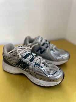 New Balance 1906R sneakers in the Silver Metallic/Deep Ocean