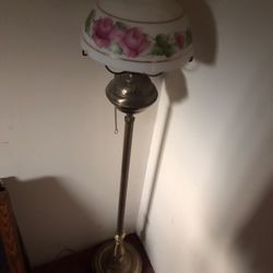 A Pair Of Tall Glass And Brass Hurricane Floor Lamps . 