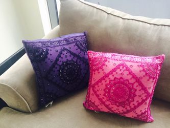 World Market- bright pink and purple throw pillows