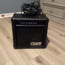  **Crate MX15R 12-Watt 1x8" Solid State Guitar Combo - Black**  Elevate your sound with the Crate MX15R, a compact 12-watt solid-state guitar combo 