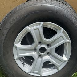 5 Rims With Tires One Is Brand New The Other Have About 40% Left 