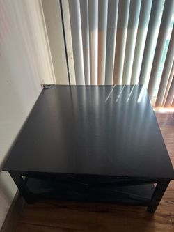 Coffee table with visible scratches