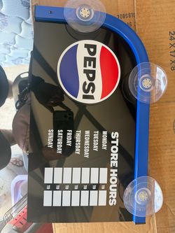 Pepsi store hour sign