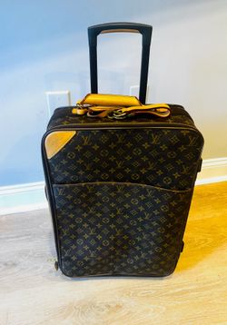 Vintage Louis Vuitton suitcase with garment bag