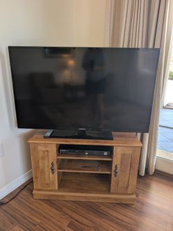 Estate sale-  Corner cabinet with TV and DVD player