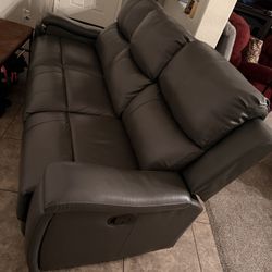 Grey Reclining Sofa. 