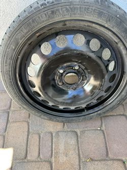 Rim And Tire T115/70