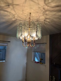 Vintage chandelier with brass chain