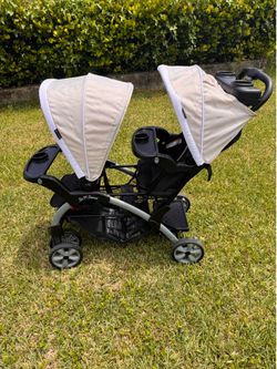 Baby Trend Double Infant and Toddler Stroller w/ Harness and Basket, Sit N' Stand, Khaki
