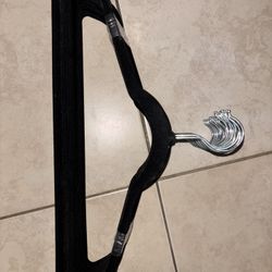 black velvet-covered clothes hangers