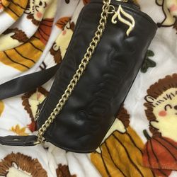 Juicy Couture Tootsie Roll Bag 