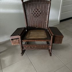Unique, vintage rocking chair with side baskets