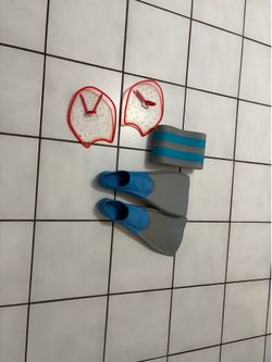 Swimming gear: Paddles, fins and pull buoy