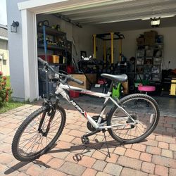 White and Red Huffy bike 