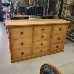 Very very large dresser. Heavy, hardwood.
