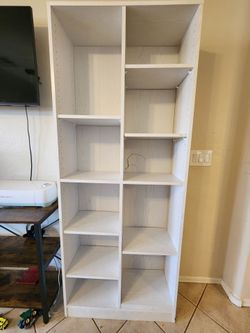 Tall white bookshelf