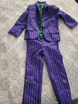The joker costume size S kids