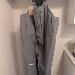 Simms Challenger Bib rain gear. New with tags, Size: 3XL  $65. 
