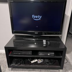 42 inch Sharp LCD HDTV with Amazon Fire TV Stick and TV Stand