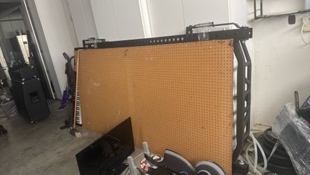 2 peg boards pegboard  w/ several attachments