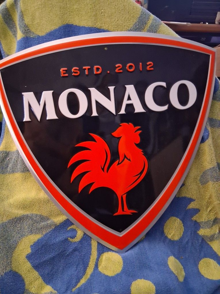 Monaco beverage metal sign.
