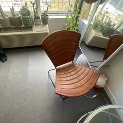 Pair of two leather chairs