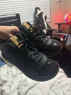 Black and gold Jordans