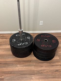 Bumper plate set 370lbs with 45lb Olympic bar.