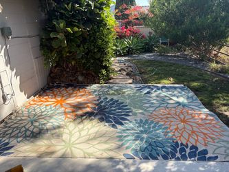 Blue, green, and orange Outdoor rug
