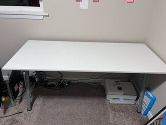 Adjustable height white desk