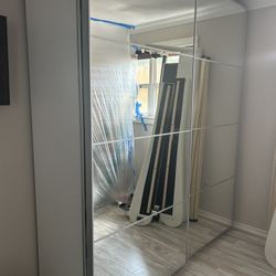 Large Stand Alone Closet With Mirror Doors 