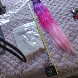 Brand New In Package 26 Inch Synthetic Ponytail With Band it's a
